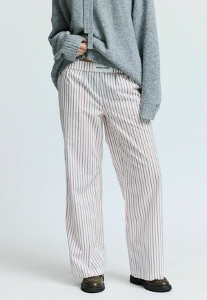 - Spodnie materiałowe