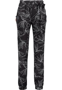 Schwarze Hosen mit einem weißen Blattmuster, elastischem Bund mit Kordelzug, seitlichen Taschen und schmal zulaufenden Bündchen für eine enganliegende Passform.