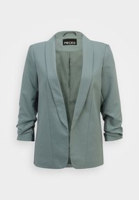 Blazer texturizado en suave verde salvia, con solapa de muesca, mangas de tres cuartos y un diseño de apertura frontal. Interior forrado.