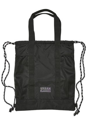 Sac fourre-tout noir en nylon durable. Comprend des poches latérales en maille, un système de fermeture à cordon ajustable et des doubles sangles. Texte : "URBAN CLASSICS."