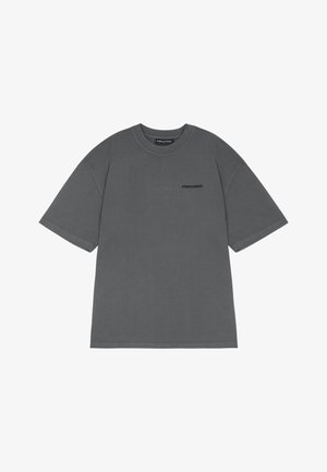 Gray cotton t-shirt with short sleeves, round neck, and front-left chest printing. Features a relaxed fit and soft texture.