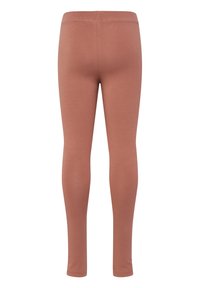 Leggings en ripstop d'un rose atténué. Fabriqués en tissu doux et extensible avec une taille élastique. Présentent une texture lisse et une forme ajustée.