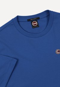 Μπλε T-shirt Colmar Originals σε κανονική γραμμή με στρογγυλή λαιμόκοψη και μικρό κυκλικό λογότυπο στο στήθος.