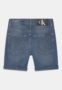 Calvin Klein Jeans REGULAR FRESH - Džínové kraťasy - denim
