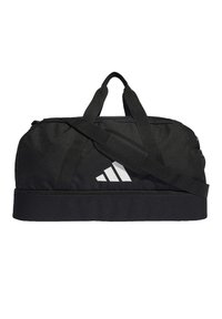 Borsa a duffle nera realizzata in tessuto resistente, dotata di manici doppi, una tracolla regolabile e un logo bianco sulla parte anteriore.