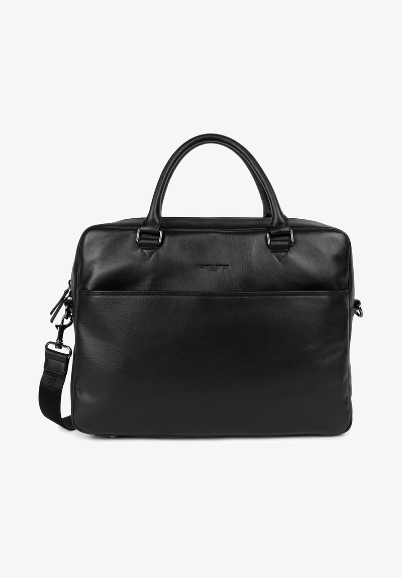 Sac fourre-tout en cuir noir avec double poignée supérieure, sangle ajustable, poche zippée à l'avant et texture lisse. Design minimaliste sans motifs visibles.