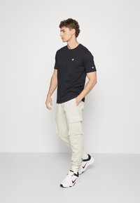 Champion CREWNECK - Základné tričko - black