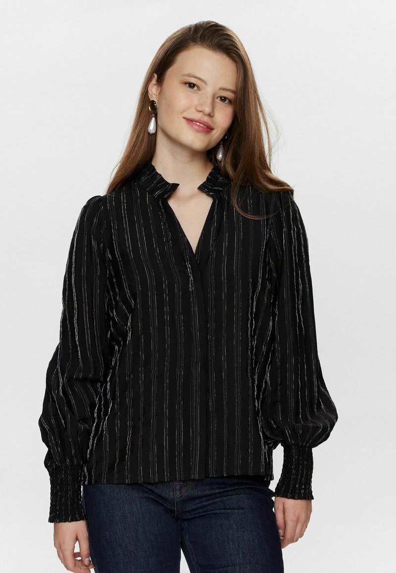 Black blouse with vertical silver stripes, high collar, and puff sleeves. Features gathered cuffs and a front opening. Textured fabric.