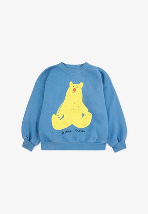 Sudadera azul con un corte relajado, que presenta un gran gráfico de un oso amarillo en el frente y puños y dobladillo de canalé. El texto debajo del gráfico dice "bobo choses."