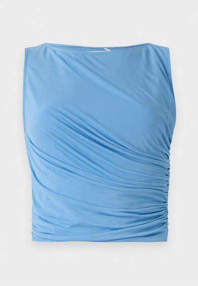Blue sleeveless top made of soft fabric featuring draped ruching on one side, with a round neckline and smooth texture.
