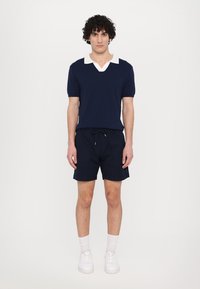 Ron Dorff Polo - deep ocean