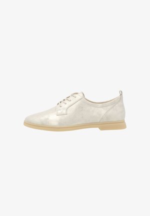 Lichtgekleurde leren schoenen met een soepele textuur en vetersluiting. Beschikt over een ronde neus en een beige rubberen zool.