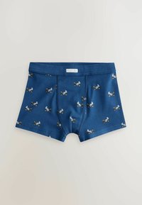 Boxer shorts in cotone blu con motivo di biciclette della polizia. Presentano una vita morbida e una texture liscia, progettati per comfort e stile.