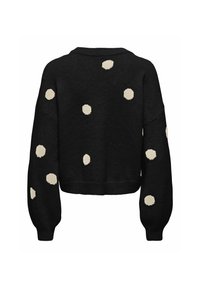Pull noir à manches longues, coupe ample, avec des pois blancs irréguliers éparpillés dans le dos et sur les manches.