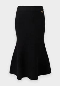 Black knit mermaid skirt with a fitted waist and flared hem. Gold accent detail at the waistband. Smooth texture and seamless design.