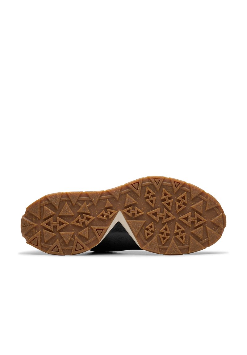 Podeszwa sneakersów z gumy z trójkątnym wzorem bieżnika, brązowy kolor z textured powierzchnią, kontrastujący czarny obszar pięty i skośny kształt.