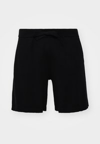 Sorte børneshorts lavet af blødt stof, med en elastisk talje og en sløjfe samt ribbet kant. Enkel design uden mønstre.