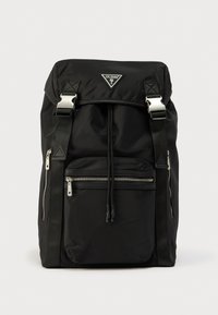 Μαύρο σακίδιο από νάιλον με ασημένια μεταλλικά μέρη, ρυθμιζόμενους ιμάντες, σύστημα κλεισίματος με κορδόνι και μπροστινή τσέπη με φερμουάρ. Διαθέτει τριγωνικό έμβλημα με λογότυπο.