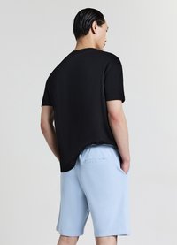 Calliope GINNICO - Pantaloni sportivi - carta da zucchero chiaro