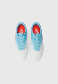 Blue and white athletic shoes with textured overlay, featuring a gradient pattern, laces, and a red insole. Perforations on the upper for breathability.