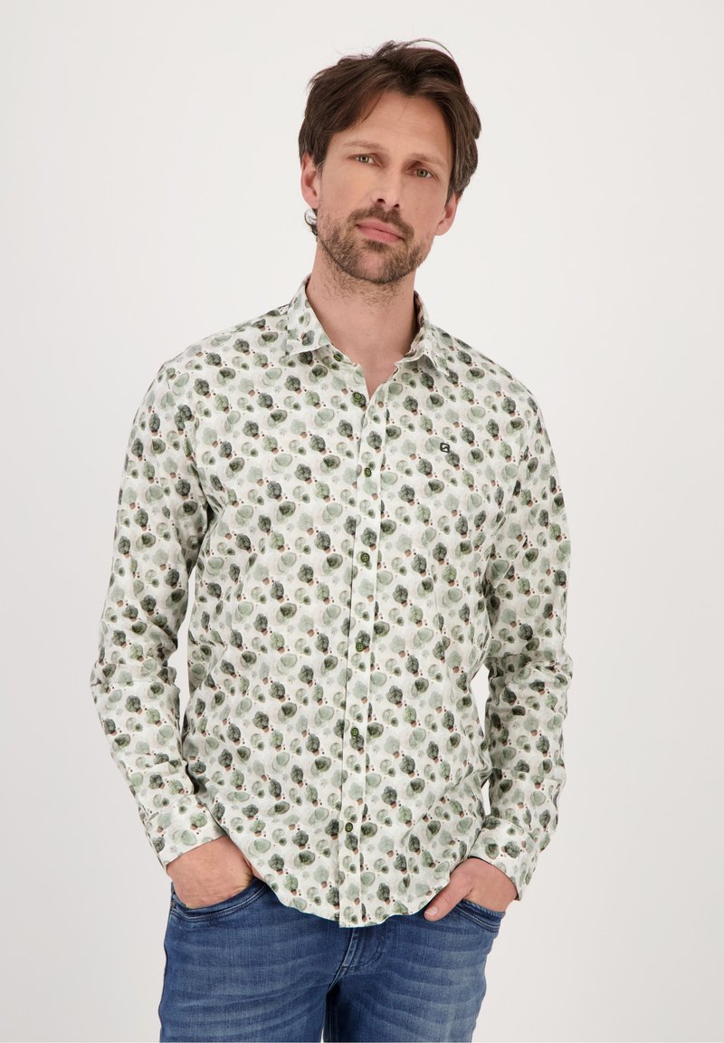 Camicia bianca con bottoni caratterizzata da un motivo verde e grigio di cavoli e fiori. Il tessuto è leggero e presenta un leggero lucido.