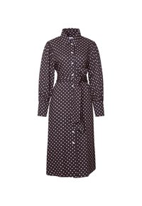 Robe midi noire à pois blancs, manches longues bouffantes, boutonnée sur le devant, col et ceinture à nouer à la taille.