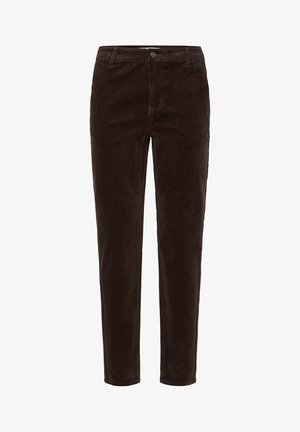 Barna kordbársony nadrág, egyenes szabással, elülső zsebekkel és cipzáros, gombbal záródó derékkal. Puha tapintás és függőleges bordázott részletek.