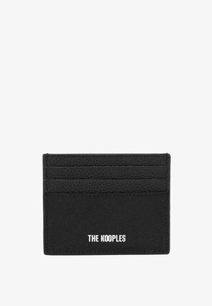 Carteira preta com três bolsos de cartão em couro e um bolso em tecido, apresentando o logótipo "THE KOOPLES" em branco na frente.