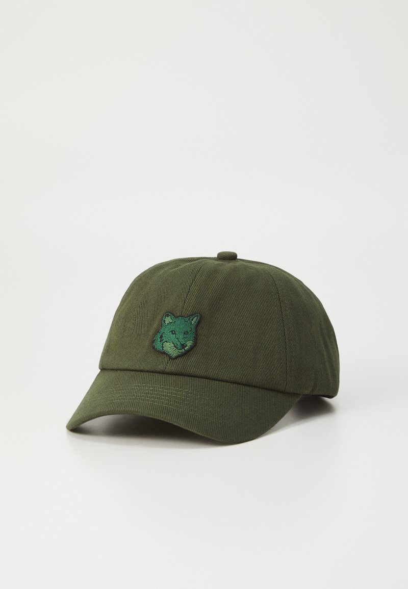 Dark green baseball cap made of cotton with a front embroidered fox design in contrasting green. Features a curved brim and adjustable strap.