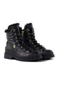 Černé kožené boty s umělým jemným kožíškem, zlatým kováním, šněrováním vpředu a bočním zipem, s robustní podrážkou a polstrovaným designem kotníku.