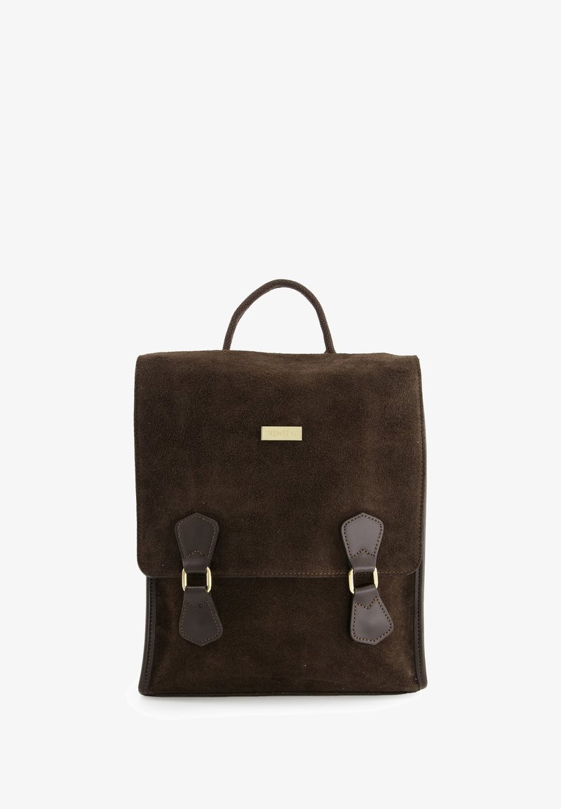 Brown suede backpack with a handle, leather accents, and gold hardware. Features a flap closure with two decorative buckles. Textured surface.