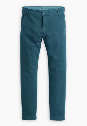 Chino teal in misto cotone, con frontale piatto, due tasche laterali e un design della gamba leggermente affusolato. Chiusura con bottone standard in vita.