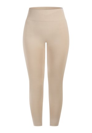 Beżowe legginsy z wysokim elastycznym pasem. Gładka tekstura i dopasowany krój, zwężający się przy kostkach. Odpowiednie do aktywności fizycznej lub na co dzień.