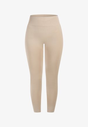Beżowe legginsy z wysokim elastycznym pasem. Gładka tekstura i dopasowany krój, zwężający się przy kostkach. Odpowiednie do aktywności fizycznej lub na co dzień.