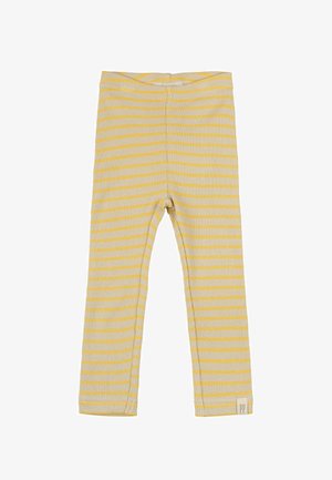 Geltonos ir baltos dryžuotos legginsai, su grublėta tekstūra, elastinga juosta ir mažas logotipo ženkliukas apatinėje siūlės dalyje.