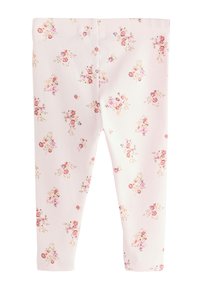 Hele-roosad soonikuldsed retuusid, millel on lillemuster roosa, oranži ja kollase toonides ning mugava elastse vöökohaga.