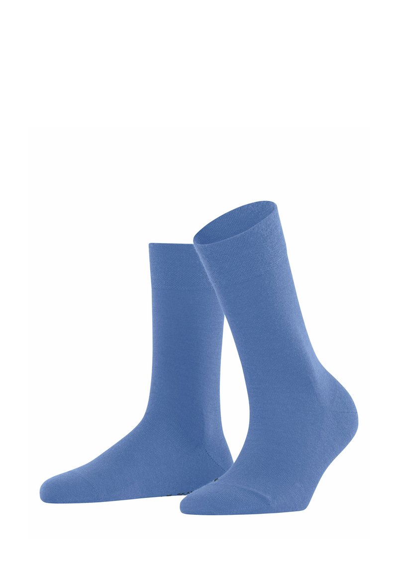 Calzini di cotone azzurro chiaro, altezza alla caviglia, con una texture liscia e punta rinforzata. Design semplice, senza motivi o dettagli aggiuntivi.