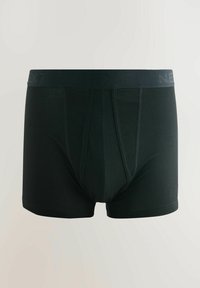 Schwarze Boxershorts aus weichem Stoff, elastischem Bund mit "NEXT"-Logo und mittellanger Passform mit Nahtdetails.