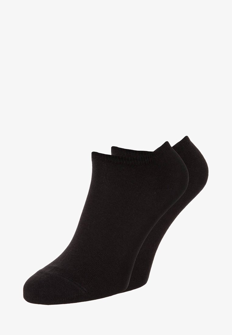 Schwarze Knöchelsocken aus einem glatten, dehnbarem Material mit einem gerippten Bündchen, das ein tief ausgeschnittenes Design und eine nahtlose Zehenkonstruktion aufweist.