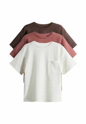 Three short-sleeve crew neck shirts stacked, colors brown, dusty rose, and white with a front pocket on the white shirt.