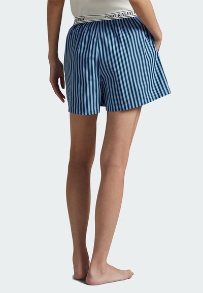 Niebiesko-zielone szorty w paski wykonane z bawełny, z elastycznym paskiem w talii z nazwą marki. Krótka długość, luźny krój, brak kieszeni.
