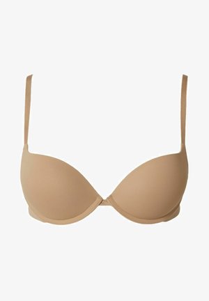 Jasnobeżowy biustonosz z wypełnieniem, wykonany z gładkiego materiału, z fiszbinenm wsparciem, regulowanymi ramiączkami i bezszwowym wzornictwem dla uzyskania opływowego wyglądu.