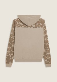 Felpa con cappuccio dal corpo beige e maniche con motivo mimetico marrone. Realizzata in tessuto morbido, presenta un orlo e polsini a coste.