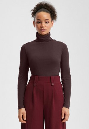 - Bluzka z długim rękawem