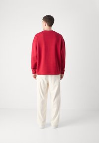 HUGO NIMAYLONG - Sportska majica - dark red