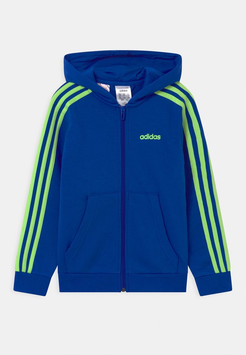 Felpa con cappuccio e zip blu con strisce verdi, cappuccio, tasche frontali e logo ricamato sul petto. Realizzata in tessuto morbido con polsini a costine.