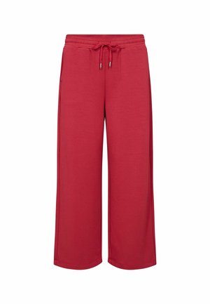 Rote weit geschnittene Hose aus weichem Material, mit einem verstellbaren Kordelzugbund und zwei seitlichen Taschen für zusätzlichen Komfort.