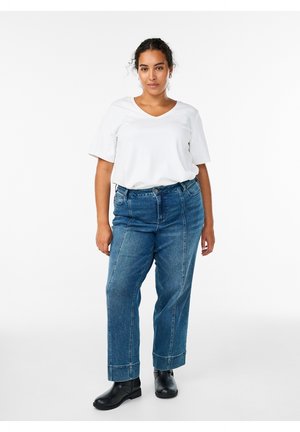 Zizzi, MARKANTEN NÄHTEN - Jeans a zampa - dark blue denim