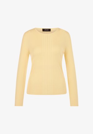 Light yellow ribbed long-sleeve sweater with crew neck and subtle vertical knit pattern, tag label inside neckline.