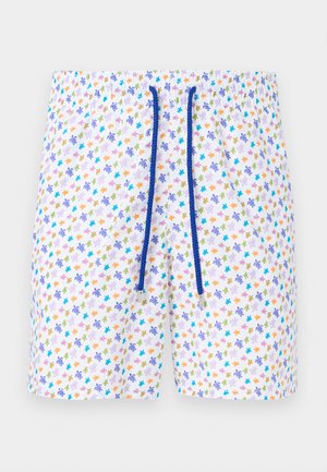 White swim shorts with multicolored small turtle pattern and blue drawstring at elastic waistband on a plain background.